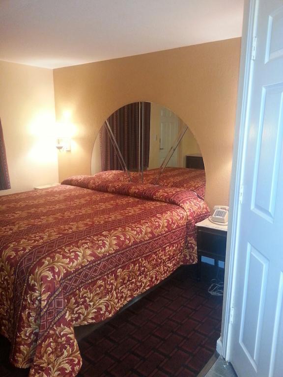 هيوستن Deluxe Inn Motel الغرفة الصورة